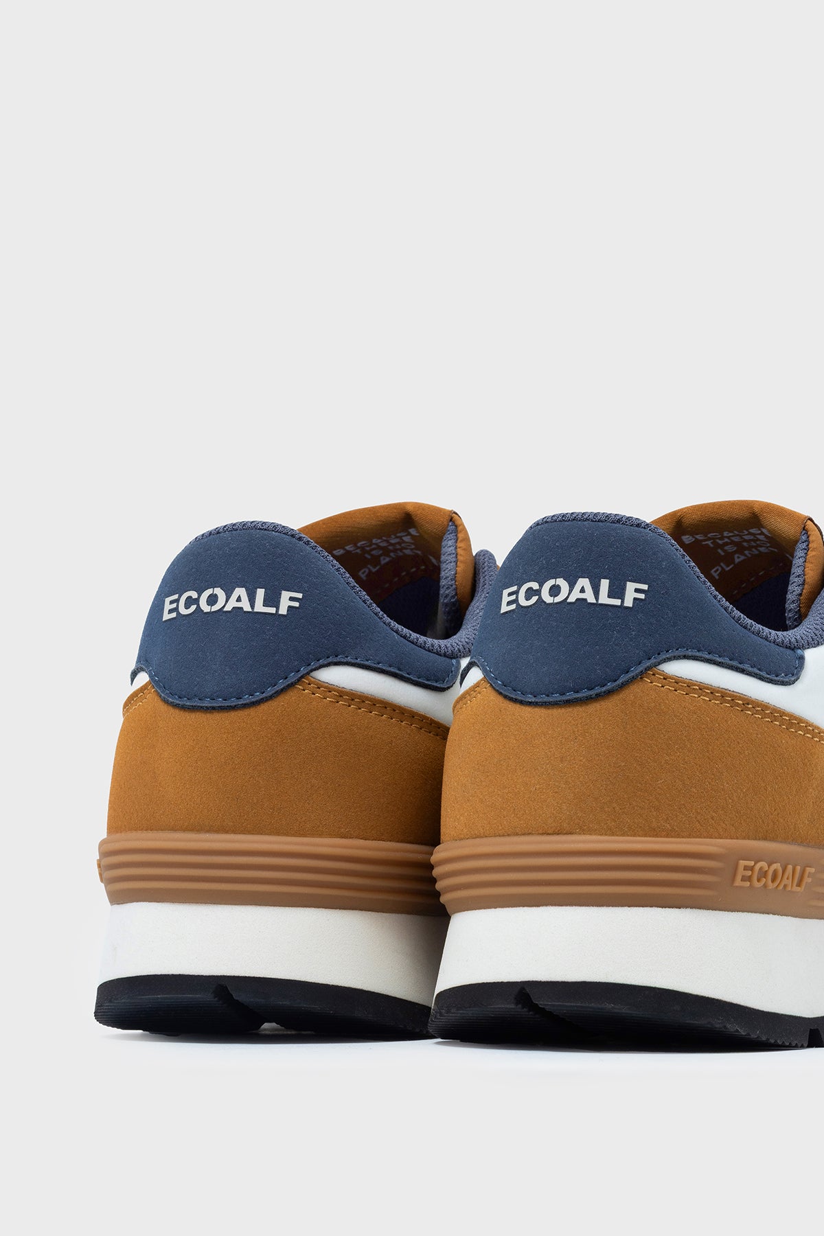 BEIGE AND ORANGE UCLA TRAINERS