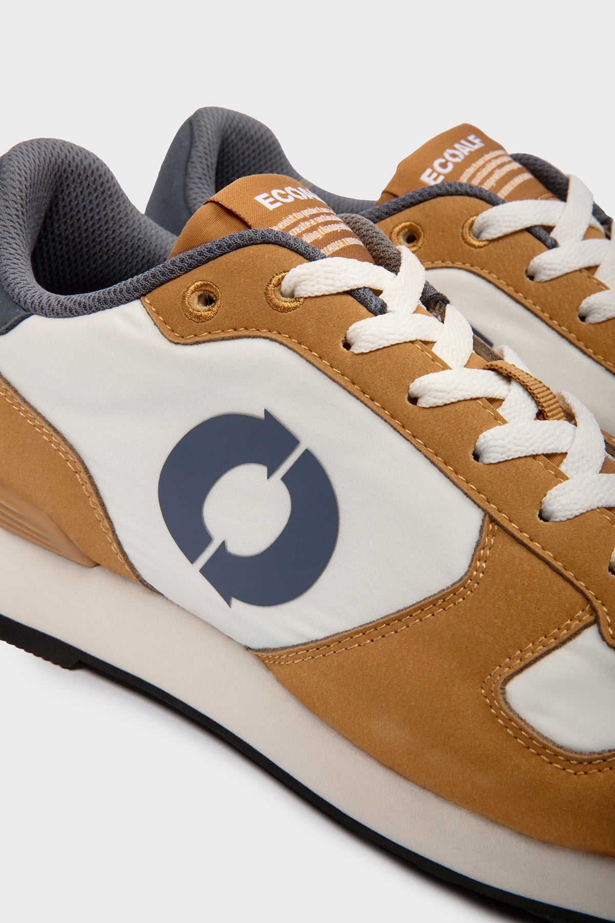 BEIGE AND ORANGE UCLA TRAINERS
